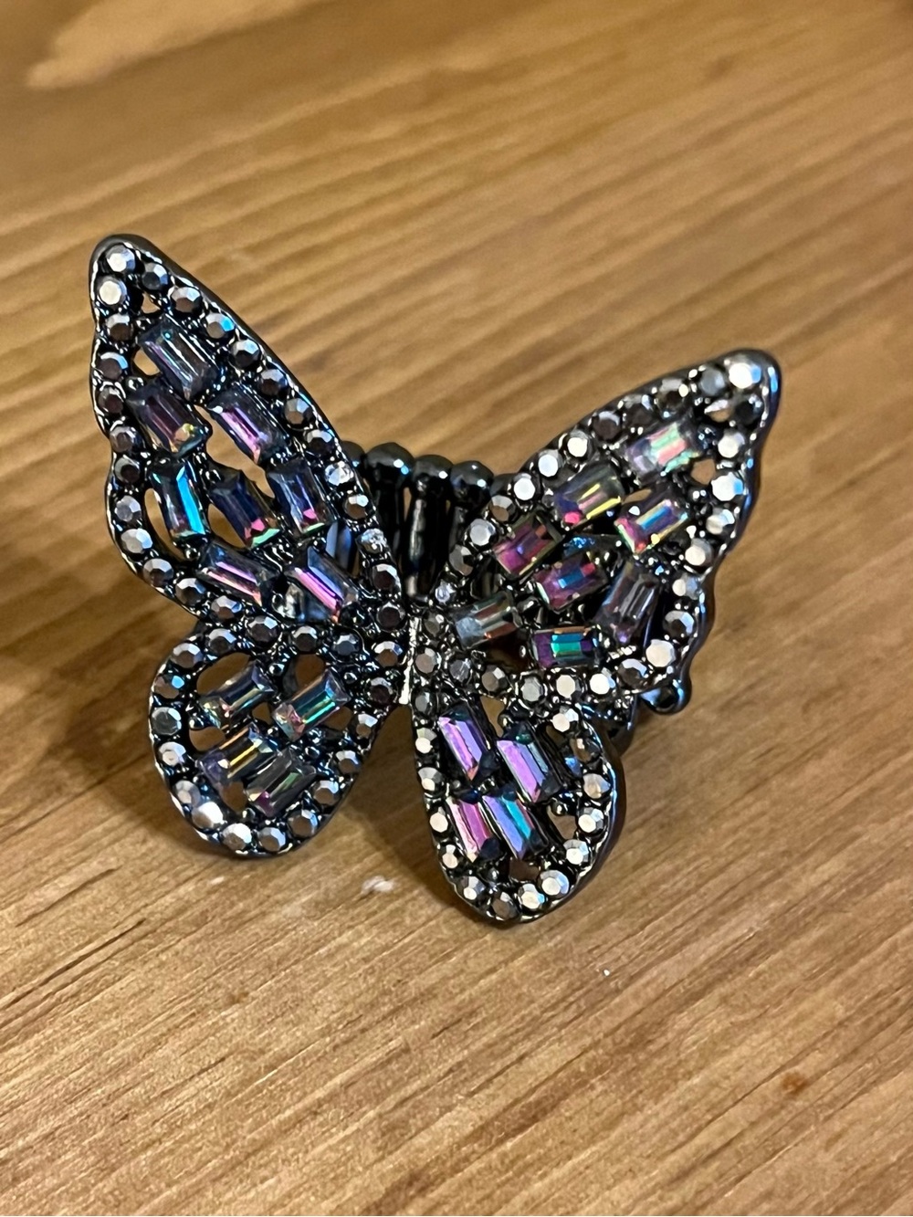 Butterfly stretch ring with abalone beads that glimmer in light starting size 6